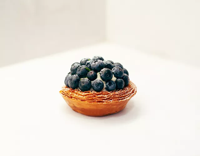 LODE Pies & Pastries blueberry tart: Croissant dough, macadamia frangipane, blueberry jam, cream cheese crème patissiere, fresh blueberries, lime zest