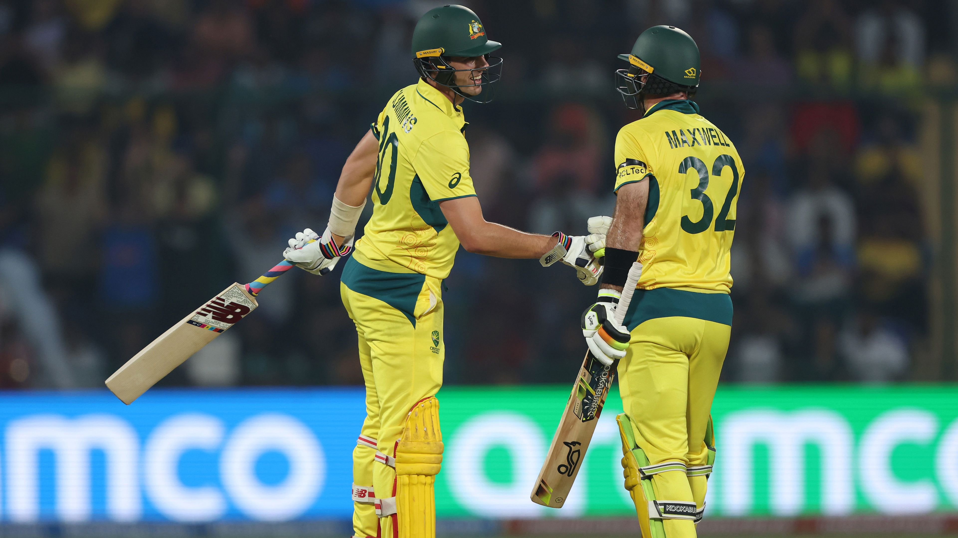 Glenn Maxwell and Pat Cummins come together during their record-breaking partnership against the Netherlands in the ODI World Cup.
