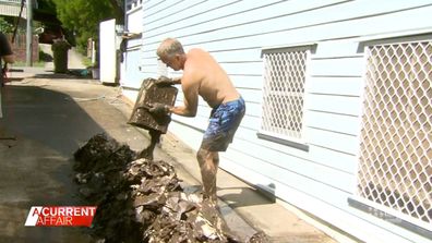 Mud army pitches in to help with Queensland's flood cleanup.