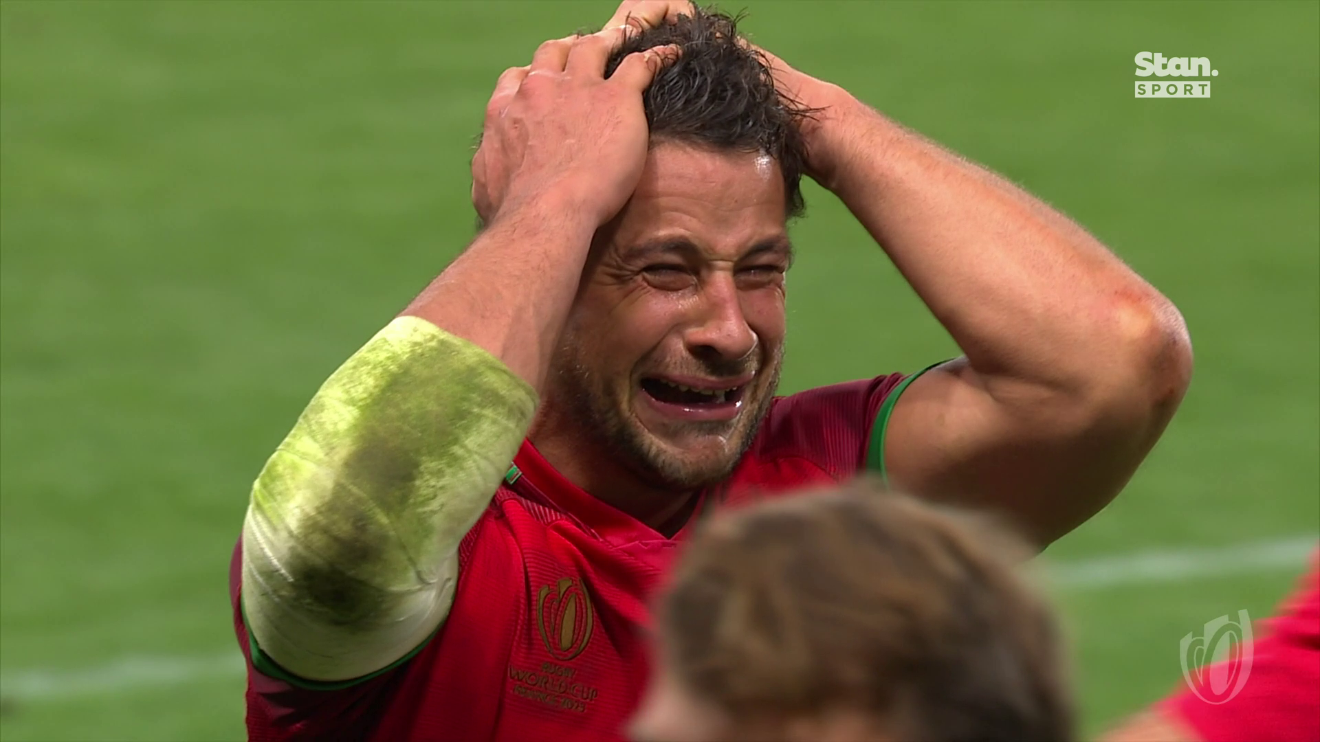 Portugal captain Jose Lima cries after his team defeated Fiji in the final pool match.