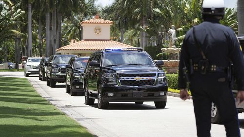 Former President Donald Trump leaves his Trump National Doral resort, Tuesday, June 13, 2023 in Doral, Florida