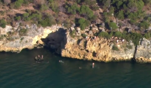 Thrill seekers were back jumping at the cliff today. 