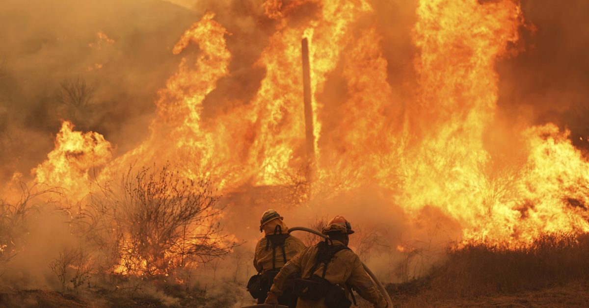 Firefighters make progress against blaze near LA that forced thousands to flee