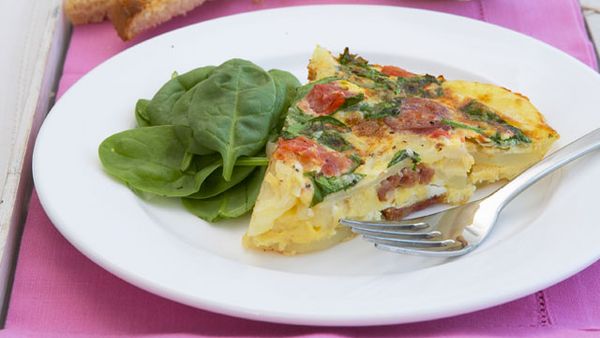 Spanish omelet with roasted tomatoes, spinach and chorizo
