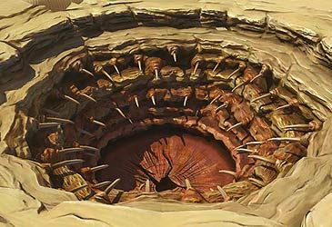 Which creature inhabits the Great Pit of Carkoon in Return of the Jedi?