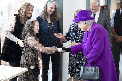 Queen revealed she wore braces as a child during first engagement since Christmas break