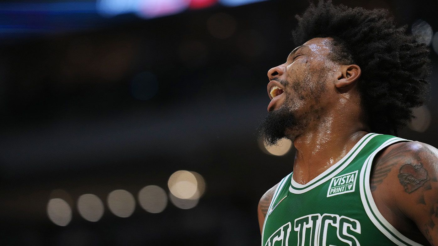 Marcus Smart #36 of the Boston Celtics reacts against the Milwaukee Bucks