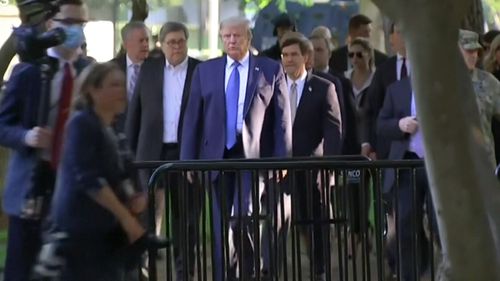 US President Donald Trump leaves the safety of the White House and makes his way to to St John's church. 