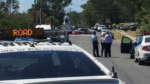 Police officers at the scene of the Riverstone standoff. (AAP)