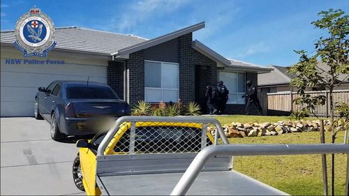 A home at Thrumster near Port Macquarie was raided yesterday by Strike Force police. Picture: NSW Police