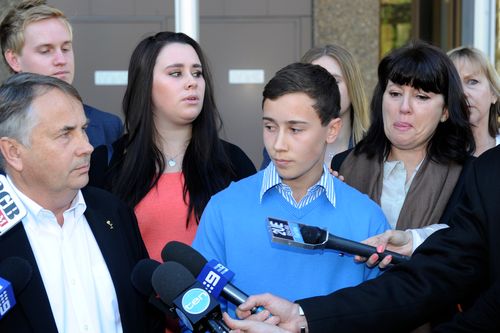 Stuart Kelly is surrounded by family as he makes his impassioned plea in 2014 to end drunken violence in Sydney. (AAP)