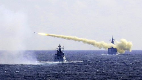 A missile is launched from a navy ship during a live ammunition drill in the East China Sea. China's navy has fired dozens of missiles and torpedoes during exercises in the East China Sea that come amid heightened maritime tensions in the region, underscoring Beijing's determination to back up its sovereignty claims with force if needed. (AAP / April, 2016)