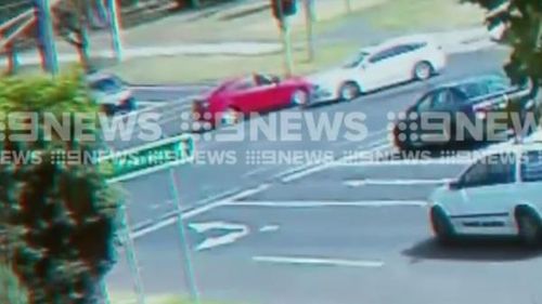 CCTV captured the offending red car in action. (9NEWS)