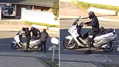 The escape vehicle was a black and white scooter.