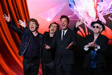 Mick Jagger, Ronnie Wood, Jimmy Fallon and Keith Richards pose for photographs during the Rolling Stones "Hackney Diamonds" press conference at Hackney Empire on September 06, 2023 in London 