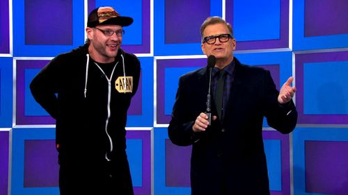 The guitarist and back-up vocalist with the show's host Drew Carey. (Twitter - @ThePriceIsRight)