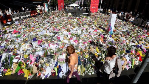 Tributes in Martin Place following the siege four years ago.