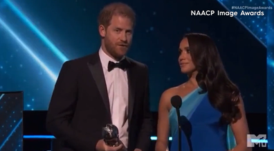 Prince Harry and Meghan Markle accept the President's Award at the 53rd NAACP Image Awards.