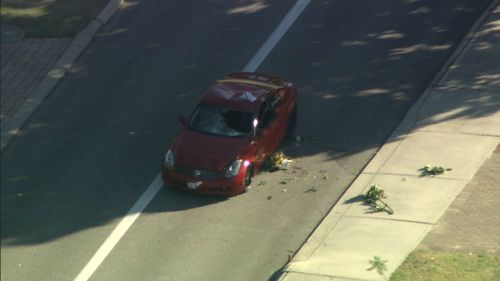 One person died when a car ploughed down a group of people. (9NEWS)