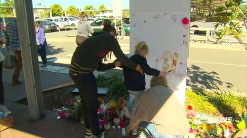 Indie's heartbroken best friend Aylah left a touching tribute on a memorial at the scene. Picture: 9NEWS