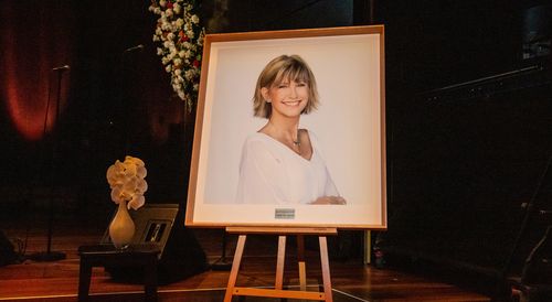 An image of the performer at the Olivia Newton John State Memorial at Hamer Hall in Melbourne.