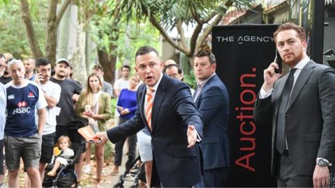 Auction property market Sydney crowd bidders