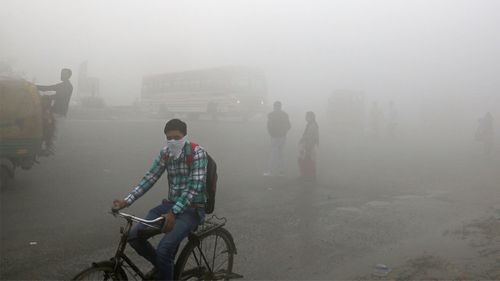 A thick blanket of smog on the outskirts of New Delhi, India.