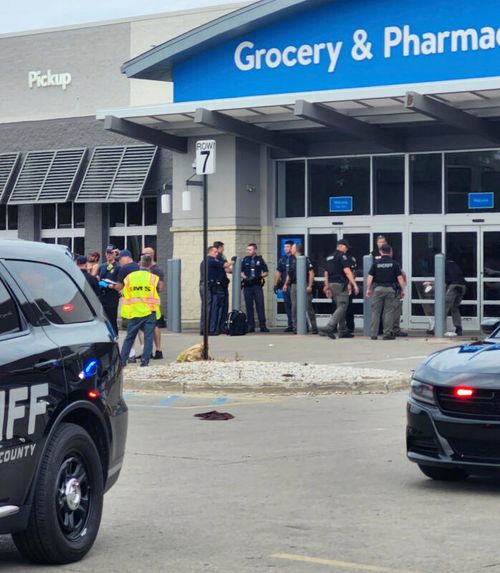 Law enforcement officers responding to a stabbing attack at a Walmart in Traverse City
