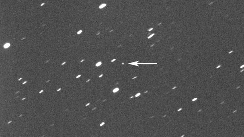 Asteroid 2023 DZ2, indicated by arrow at centre, about 1.8 million kilometres away from the Earth. On Saturday, March 25, 2023, the asteroid, big enough to wipe out a city, will harmlessly zip between Earth and the moon.