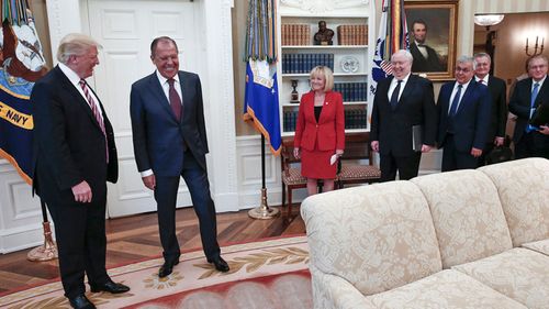 White House fumes after Kremlin releases Trump meeting photos