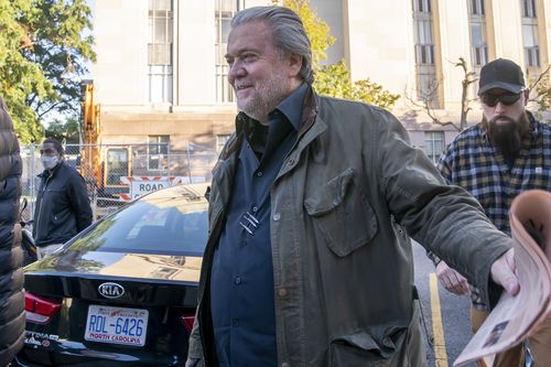 Steve Bannon, centre, a longtime ally of former President Donald Trump, convicted of contempt of Congress, arrives at federal court for a sentencing hearing, Friday, Oct. 21, 2022, in Washington