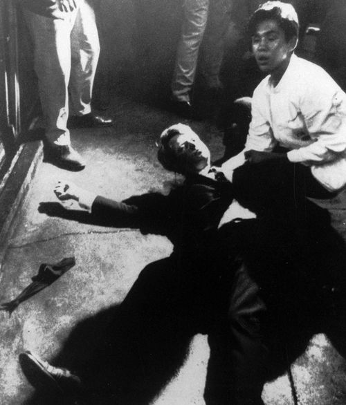 Senator Robert Kennedy awaits medical assistance as he lies on the floor of the Ambassador hotel in Los Angeles moments after he was shot June 5, 1968. (AAP)