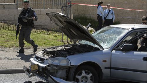 'Terrorist' driver crashed car into crowd before trying to stab them in Jerusalem: police