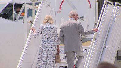 King Charles and Queen Camilla board a plane from Sydney, Australia.