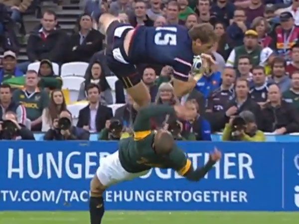 South African winger Bryan Habana and US fullback Blaine Scully collide contesting a high kick. (Supplied)