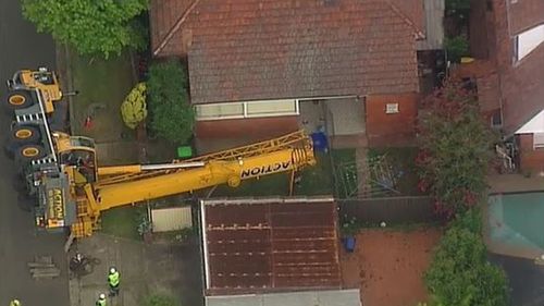 The crane collapsed in Clemton Park in Sydney's south-west.