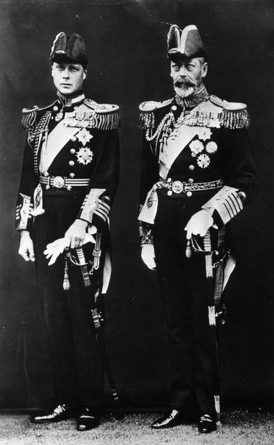 June 1922:  King George V of Great Britain on the steps of Buckingham Palace with his son Prince Edward, later King Edward VIII.  (Photo by Topical Press Agency/Getty Images)