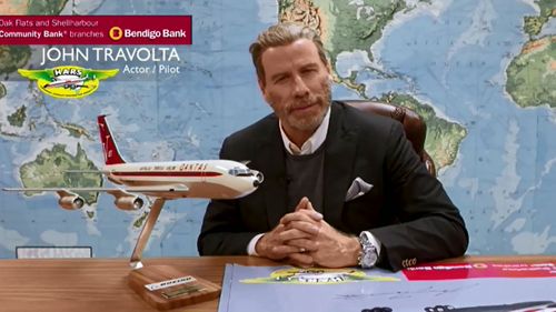 John Travolta says he "can't wait" to arrive at Illawarra Airport.