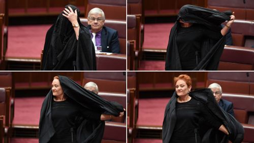 Senator Hanson removed the burqa before speaking. (AAP)