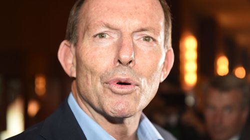 Former Prime Minister Tony Abbott speaks with Liberal Party members at the NSW Liberal State Council in Sydney. (AAP)