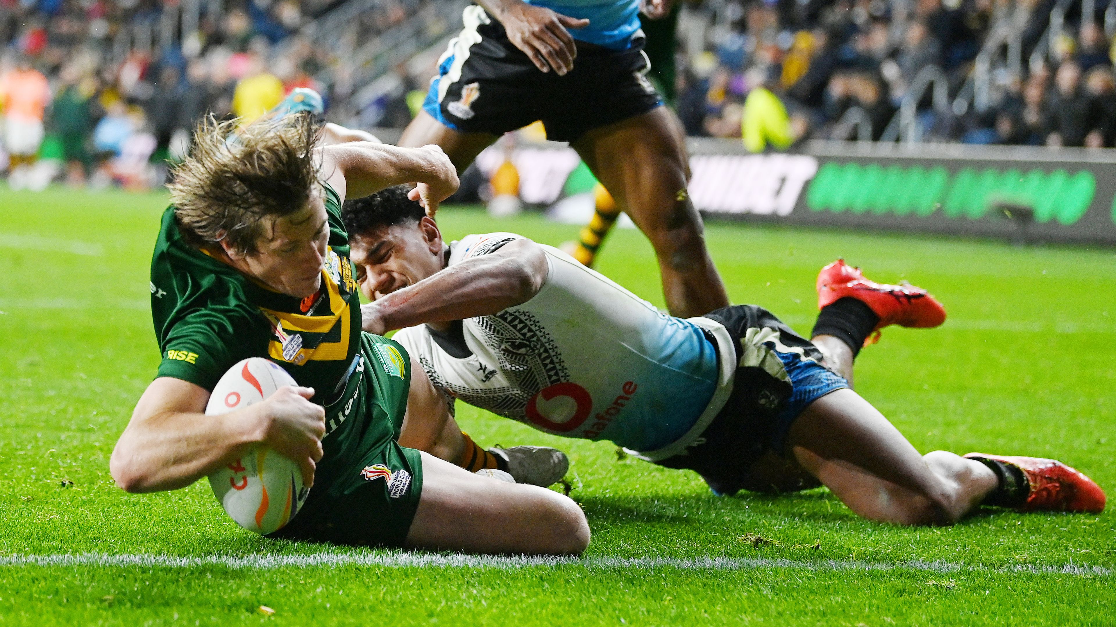 Harry Grant of Australia touches down for their side&#x27;s fifth try during the Rugby League World Cup 2021 Pool B match between Australia and Fiji at Headingley on October 15, 2022 in Leeds, England. (Photo by Gareth Copley/Getty Images)