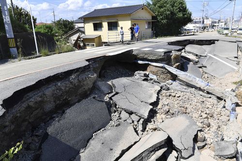 The highest rainfall Japan has seen in decades has wreacked havoc on the country's western region. Picture: AP