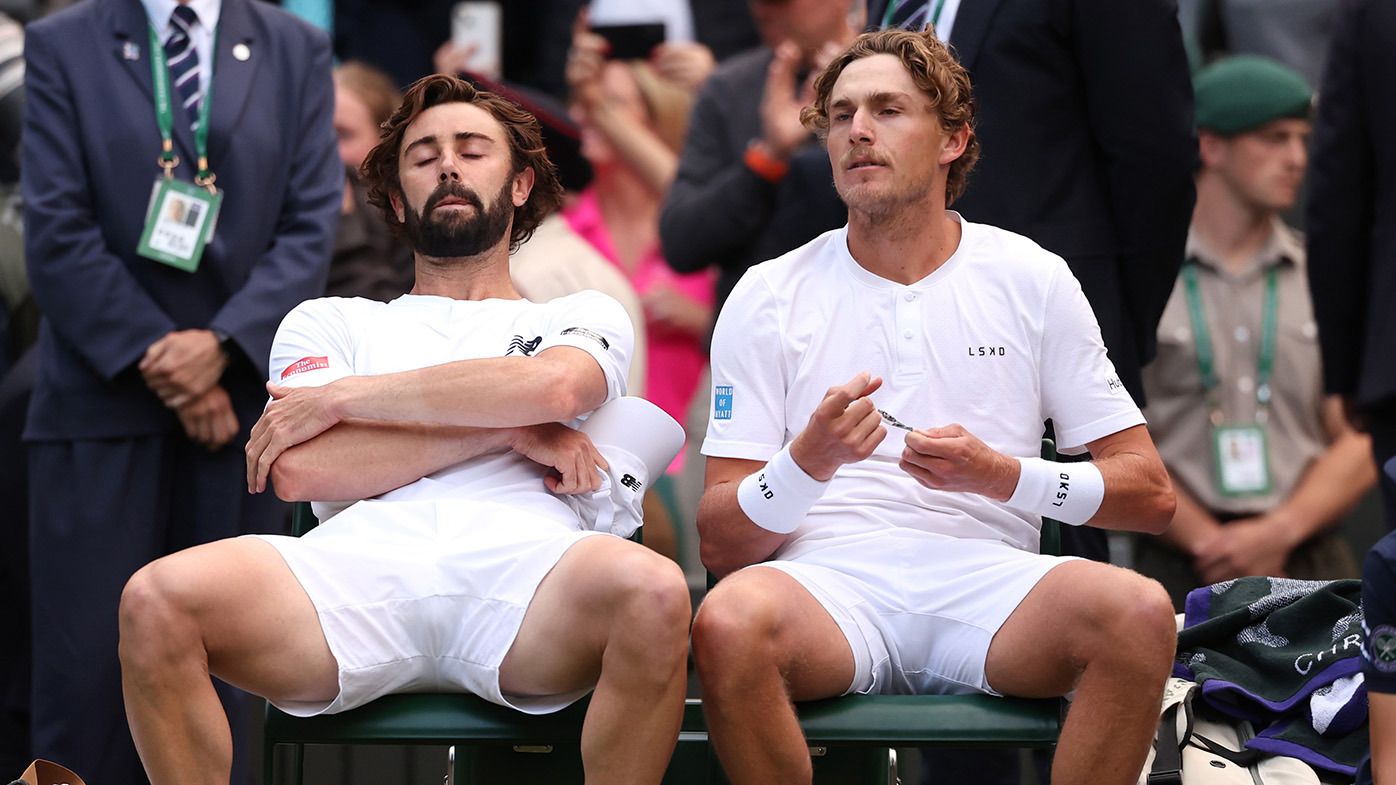 Jordan Thompson and Max Purcell of Australia look dejected following defeat against Henry Patten of Great Britain and Harri Heliovaara of Finland in the Gentlemen&#x27;s Doubles Final during day thirteen of The Championships Wimbledon 2024 at All England Lawn Tennis and Croquet Club on July 13, 2024 in London, England. (Photo by Julian Finney/Getty Images)