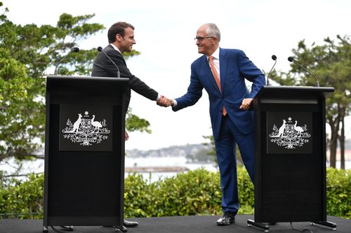 Shaking on it: Emmanuel Macron and Malcolm Turnbull signed off on a joint venture in silicon quantum computing. Picture: AAP