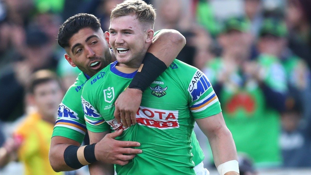 Hudson Young of the Raiders celebrates with teammates after scoring a try during the round 24 NRL match between the Canberra Raiders and the Manly Sea Eagles at GIO Stadium