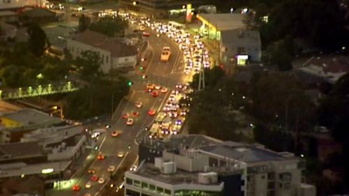 The crash caused lengthy traffic delays as Monday morning commuters waited for the scene to clear. (9NEWS)