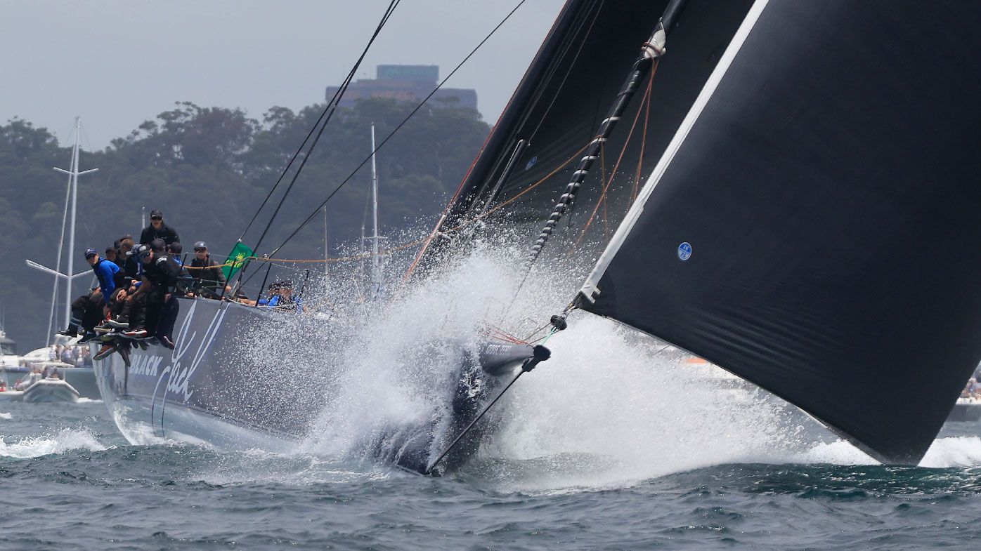 Black Jack sails up the harbour during the 2021 Sydney to Hobart race start on Sydney Harbour on December 26, 2021 in Sydney, Australia