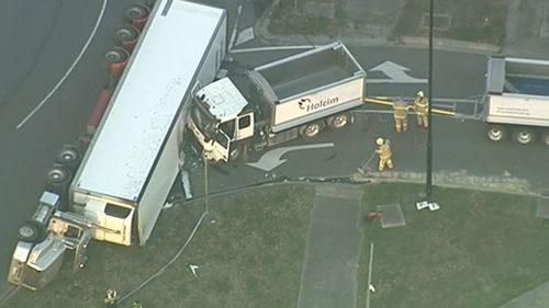 The truck has rolled over, blocking all city bound lanes. (9NEWS)