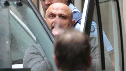 Binse leaving the Victorian Supreme Court in 2013 following his arrest in May over a 44-hour standoff with police in Keilor East (Image: AAP)