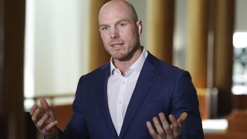 Senator David Pocock addresses the media at a press conference 